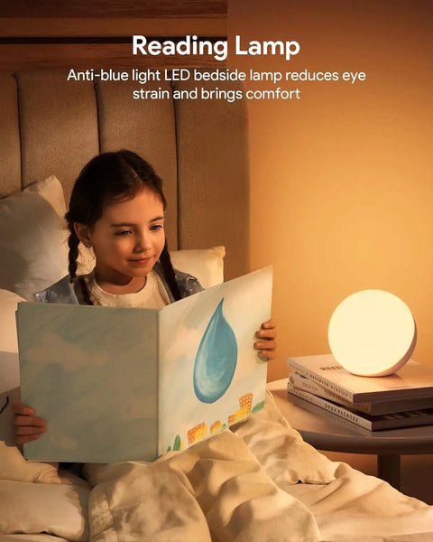 Girl reading by Touch Lamp Multicolor Night Light For Kids, Small LED Table Lamp For Bedroom, soft ambient lighting.