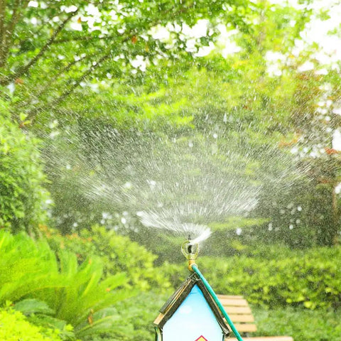 Heavy Duty 360 Degree Rotating Rooftop Sprinkler For Backyard Boss Lawn Cooling And Garden Watering With Smooth Sweep Adjustment And Built Different Zinc Frame spraying water in a lush garden.