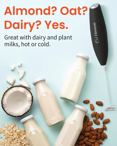 Elementi Handheld Electric Drink Mixer Wand With High Speed Motor For Frothing Milk Blending Protein Shakes And Whisking Cocktails. Easy To Use Mini Frother Stick For Coffee, Tea, And Creamy Lattes In Burgundy Color. Durable Battery Operated Design For with almond and oat milk bottles and almonds.