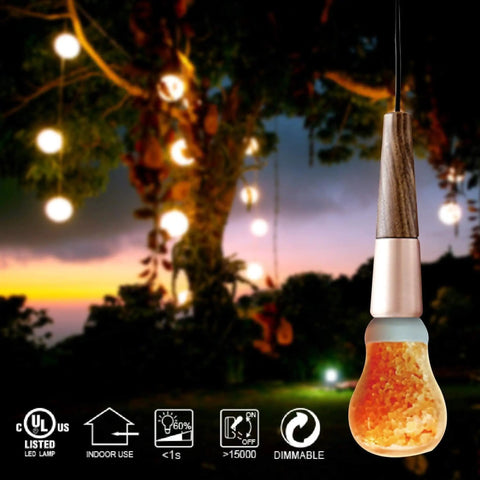 Salt Light Bulbs 60 Watt Equivalent 7W Dimmable LED A19 Salt Lamp with glowing amber light in outdoor setting