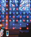Hanging Star Curtain Lights For Window With 70 Star String Lights USB Plug In 8 Modes Twinkle Fairy Lights Lit Red White Blue Holiday Decor For Independence Day Memorial Day Fourth Of July 10ft By 2.6ft displayed in a window setting