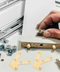 Hand assembling cabinet with Brass Invisible Door Hinges Set Down Pivot Concealed Design Hidden Pivot Hinge for Cabinets and Closets