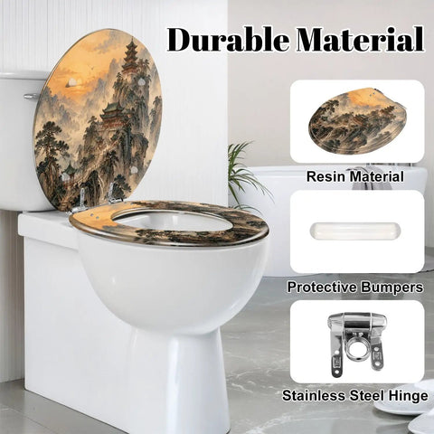 Round Mountain Temple Chinoiserie Sunrise Misty Chinese Ink Toilet Seat on white toilet, showcasing durable resin design and protective bumpers.