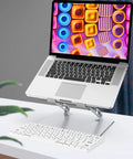 Adjustable Laptop Stand For Desk With Ergonomic Design, Ventilated Cooling, And Foldable Metal Riser holding a 15-inch laptop
