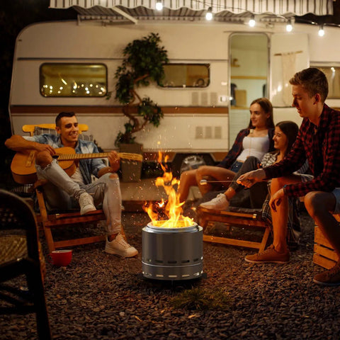 People enjoying garden night around 15 Inch Smokeless Outdoor Fire Pit For Patio Hangouts, Steel Portable Fire Pit With Removable Ash Pan And Carry Bag