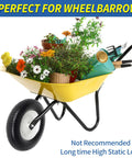 Wheelbarrow with 16 Inch Flat Free Solid Tire And Wheel For Wheelbarrows And Carts Size 4.80 4.00 8 displayed with plants and tools