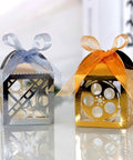 50 Pieces Hollow Out Film Wedding Favor Boxes with Ribbon for Candy and Chocolate Treats, reflective silver and gold.