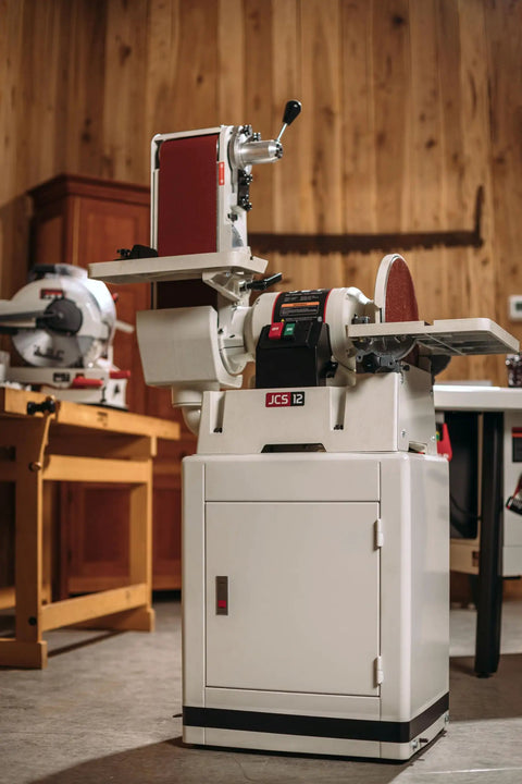 Heavy Duty 6 By 48 Inch Belt And 12 Inch Disc Sander With Closed Stand One Point Five Horsepower dual voltage unit in workshop.