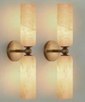 Natural Spanish Alabaster Wall Sconces Set Of Two Hardwired 20 Inch Wall Mounted Light Fixtures In Solid Brass on wall.