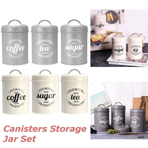 Heavy Duty Metal Coffee Canister Set Of Three Wide Mouth Kitchen Storage Jars For Beans Tea Sugar And Nuts in silver and white.