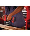 Person using V20 Cordless Drill And Driver Kit With One Half Inch Chuck Battery And Charger Included High Output 320 Watts