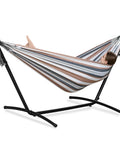 Woman relaxing in a Double Hammock With Stand For Outdoor And Indoor Use Portable Space Saving Heavy Duty Steel Frame Easy Assembly