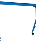 Rock Solid Steel Fixed Gantry Crane With Smooth Rolling Phenolic Casters 10 Foot Span And 6000 Pound Capacity Built Like A Truck For Daily Shop Grinds In Classic Blue Finish - front view.