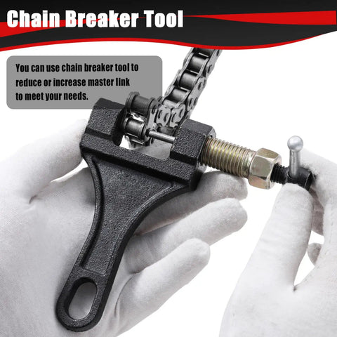 Hands using chain breaker tool for 428 Motorcycle Chain With 132 Links And Chain Breaker For TTR125 TTR225 ATV Go Kart Heavy Duty