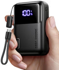 Ultra Compact Wallet Sized Laptop Power Bank Featuring Hella Fast 65W Triple Port Charging And Massive 20000mAh Built In Battery in hand
