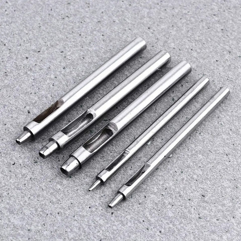 Leather Hole Puncher Set Five Piece With Steel Hollow Round Punch Tools 1-5mm For Belts, Watch Bands, And Vinyl Crafts on gray surface