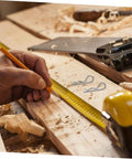 Hand marking wood with measuring tape and pencil, Versatile Cotter Pin Clips Set For Trailer Hitches And Equipment in view