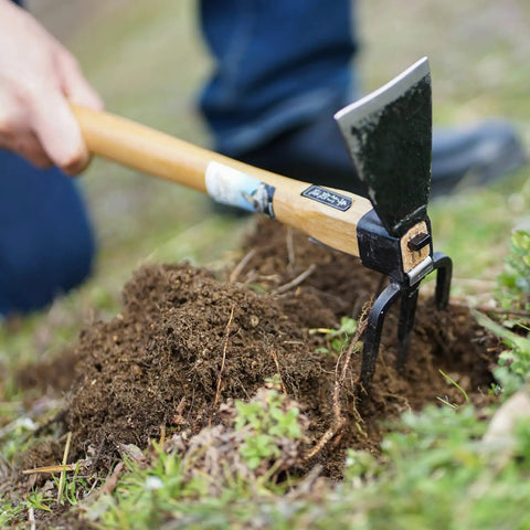 Forged Garden Hoe And Cultivator Hand Tiller From Classic Japanese Craftsmanship used for precision weeding in soil