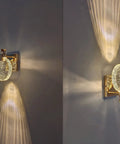 Crystal Bubble Wall Sconce LED Light in Nordic Gold Finish with glass bubble shade, elegant wall fixture, lighting up a room.