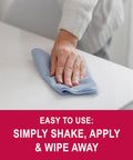 Hand wiping surface with cloth using OZ Cream Polish One Quart For Cleaning And Polishing And Preserving Surfaces In One Easy Application Anti Static Dust Repellent Great For Wood Furniture Venetian Blinds Bathroom Fixtures And Other Smooth Surfaces