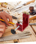 Pocket Hole Jig For Woodworking With Quick Clamp And Drilling Locator Guide Rail on a workbench with tools and a ruler.