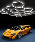 Hexagon Garage Ceiling Lights 18-Grid LED Panel, 72 Pack Ultra Bright 70,000 Lumens installed in garage with car underneath