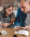 Father and daughter using Mechanical Learning Kit With Transparent Demonstration Model And Precision Metal Tools on table.