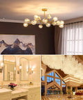 Chandelier and lamps illuminating luxurious bathroom and hotel lobby