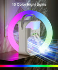 Chill Anywhere With This Dual Nozzle Portable Evaporative AC with colorful lights and remote on a table.