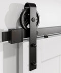 Close-up of Six Foot Heavy Duty Sliding Barn Door Hardware Kit for 1 3/8 to 1 3/4 Inch Thick Doors with black finish J shape hangers.