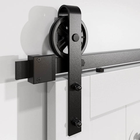 Close-up of Six Foot Heavy Duty Sliding Barn Door Hardware Kit for 1 3/8 to 1 3/4 Inch Thick Doors with black finish J shape hangers.