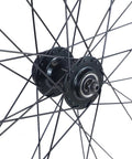 Close-up of Front 100mm QR hub on Versatile Mountain Wheelset For 26, 27.5, And 29 Inch Bikes With 6-Bolt Disc Brakes