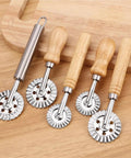 Assorted multipurpose dough roller and pastry wheel cutter for pizza, wooden handles, round blades, kitchen gadget for home chefs.