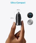 Hand holding Rapid 30W USB C Car Charger with Dual Ports Type C Power Delivery and PowerIQ 3.0, ultra-compact size shown.