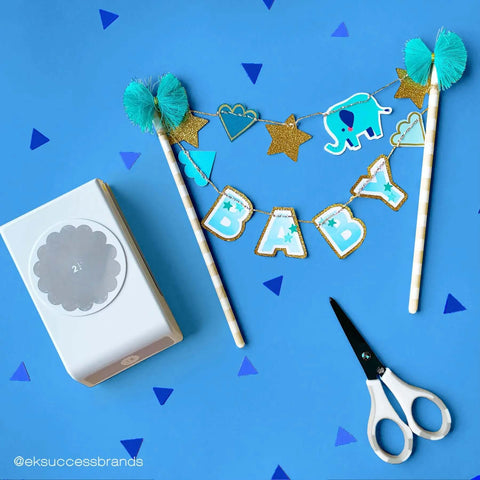 2.25 Inch Scalloped Circle Punch For Scrapbooks And Card Making, scissors, and craft decorations on blue background