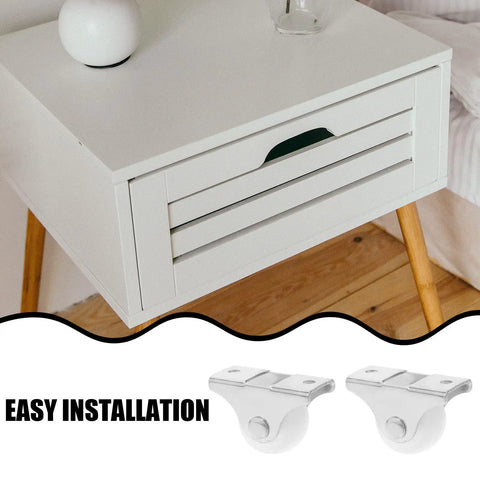 12pcs Inch White PP Directional Caster Wheel for Furniture DIY mounted on a white drawer for easy installation.