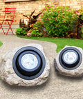 Rock Solar Garden Lights With Hella Bright LEDs Solar Powered Landscape Lighting for pathways and yards, two stone lights on pathway.