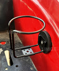 2 Pack Magnetic Cup Holder For Tractor And More, installed on a red tractor panel, heavy-duty stainless steel with black magnetic base.