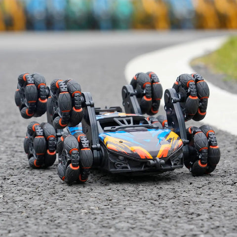 Epic 8 Wheel Hand Controlled RC Stunt Car With Gesture Sensing Remote on asphalt road, performing tricks outdoors.