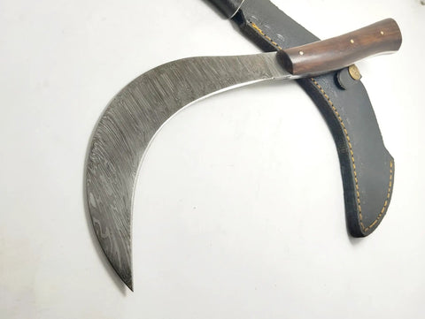 Hand Crafted Damascus Steel Sickle Knife With Full Tang And Stabilized Rosewood Handle displayed with sheath
