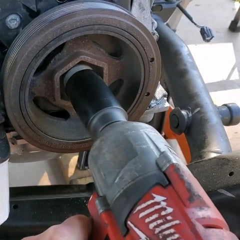 Honda 19mm Harmonic Balancer Socket Tool for Crank Bolt in action on engine, heavy duty 1/2 inch drive, deep counter-weighted.