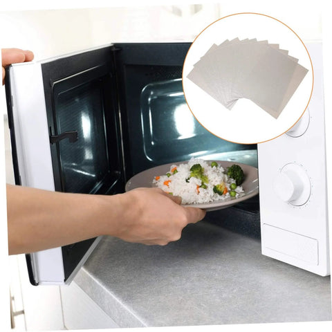 12 Pack Mica Plate Sheets For Microwave Waveguide Covers, Heat Resistant Insulation in a kitchen setting with open microwave