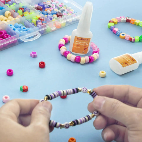 Clear Jewelry Glue For Elastic String With Built-In Brush, Quick-Dry Craft Adhesive for bracelets and beading projects.