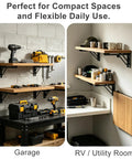 Rock Solid 16 Inch Folding Shelf Brackets Heavy Duty Steel Wall Mounts For Everyday Grind Drop Down Table Garage Kitchen Laundry Storage Solutions Black Two Pack in garage and RV setting.