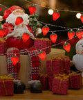 Warm Strawberry String Lights 10 Foot with 20 LEDs Battery Powered Indoor Outdoor Decor illuminating Santa and gifts