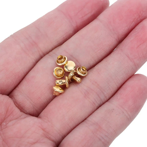100 Sets Double Cap Leather Rivets And Snap Fastener Kit For Garments, DIY Leathercraft Hardware, Pro Grade Heavy Duty Metal Rivets With Easy Install, Includes Snap Buttons, Perfect For Jackets, Bags, Belts And More. Gold rivets in hand