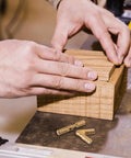 Hands fitting a wood box lid with Beefy Heavy Duty Brass Cylinder Invisible Hinges Set 10 Pieces, 5mm Thick Fixed Concealed Barrel Hinges.