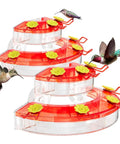 Two Pack Window Hummingbird Feeders With Strong Suction Cups, Red Color, 7 Feeding Ports, Easy Refill And Clean, Perches For Resting, Lightweight Plastic, Great Gift For Bird Lovers, 10oz Capacity Per Feeder showing feeding hummingbirds.