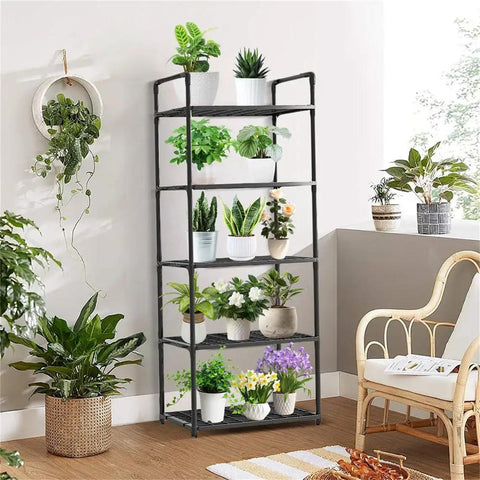Five Tier Storage Rack For Kitchen And Laundry Room Height Adjustable Microwave Cart Rock Solid Steel Frame with potted plants.