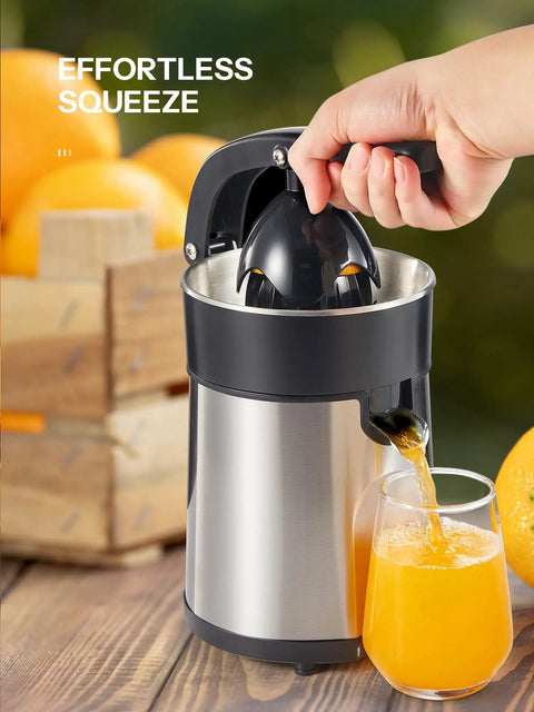 Electric Citrus Juicer With Brushed Stainless Steel Finish extracting juice into a glass, showcasing its dual-size cone feature.